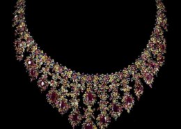 Natural Top Red Ruby & Fancy Sapphire 728 Cts Necklace on icollector.com auction site. How much should I bid?