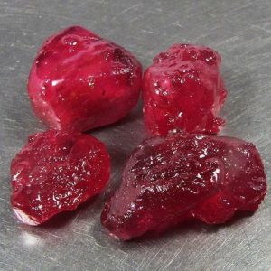 Lead glass-filled, uncut rubies