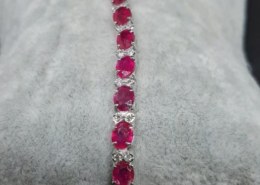 18 K Gold bracelet with Rubies on Catawiki auction. Are these natural or composite rubies?