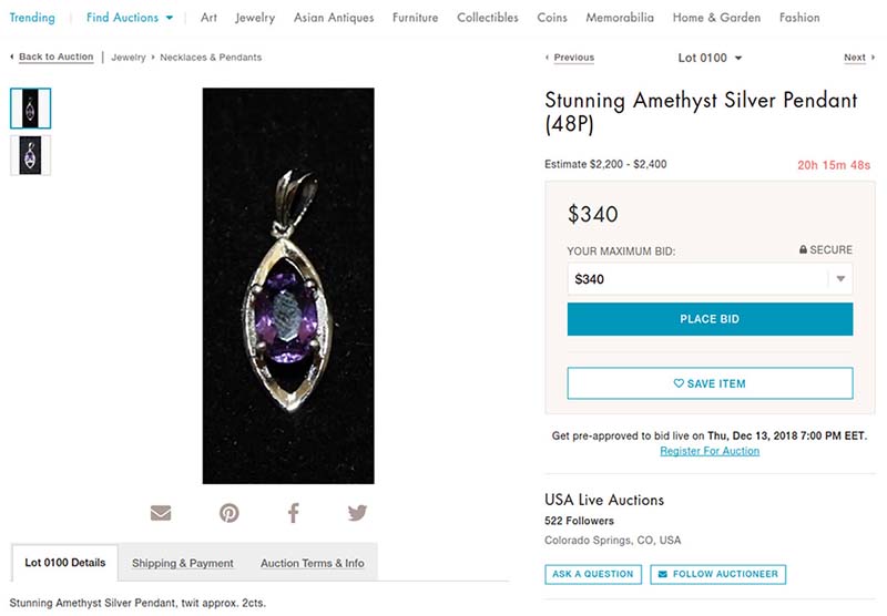 Sterling silver pendant with an amethyst at Liveauctioneers